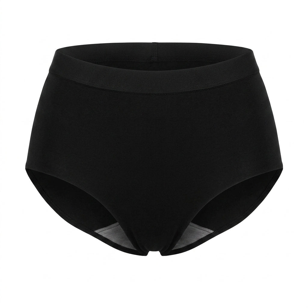 Braga talle alto Essential Anita en color negro, diseñada para comodidad y sujeción diaria.
